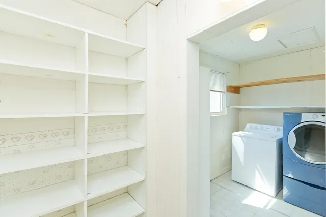 a bathroom with a toilet and a sink