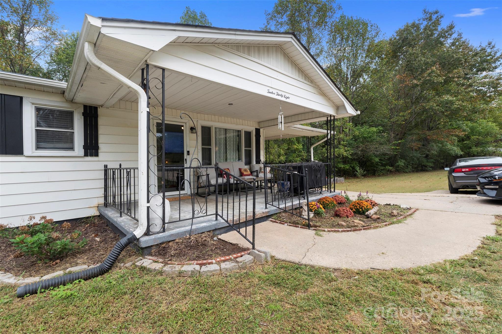 1238 Oak Grove Road Kings Mountain, NC 28086 - Photo 13 of 36 a view of a house with backyard and sitting area