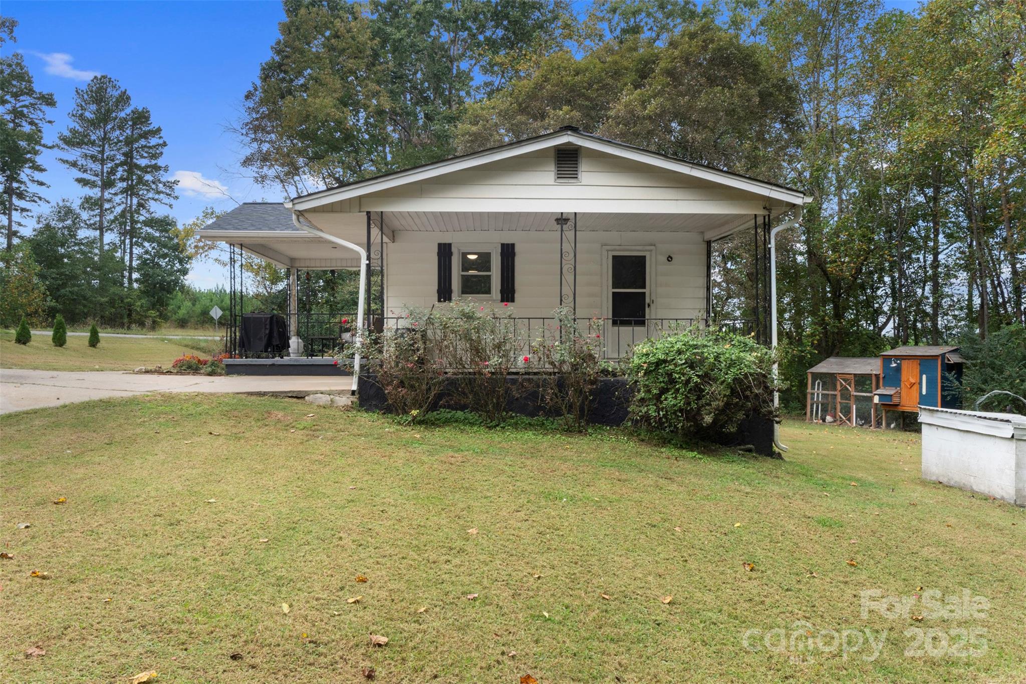 1238 Oak Grove Road Kings Mountain, NC 28086 - Photo 21 of 36 a view of a house with garden and yard