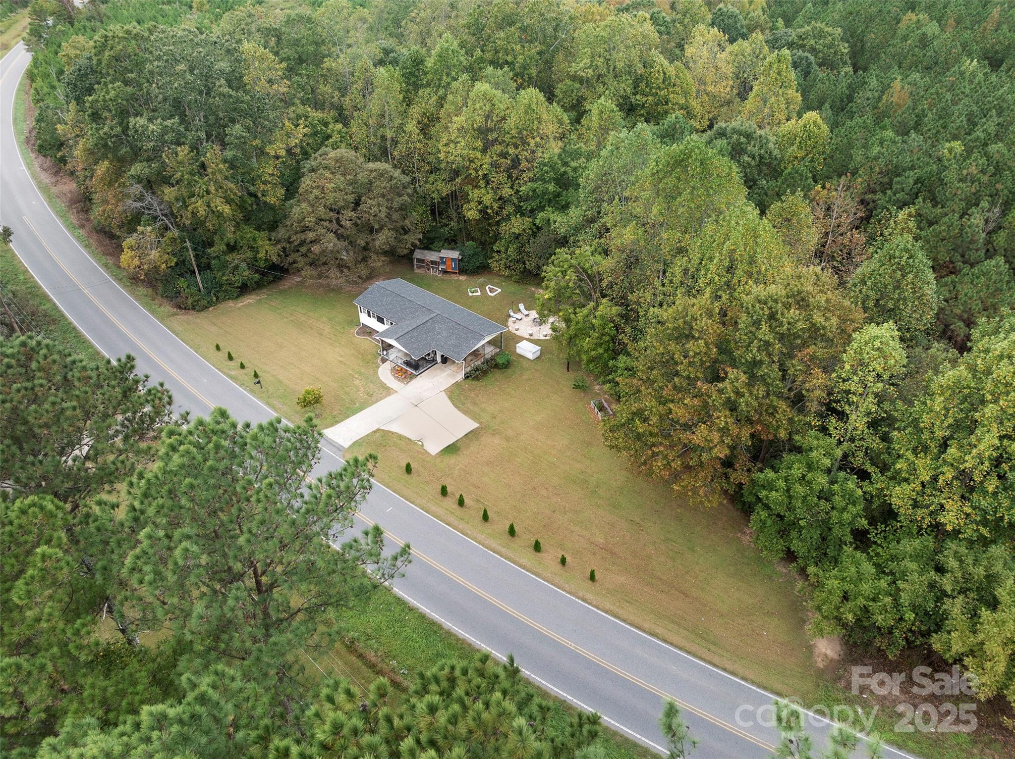 1238 Oak Grove Road Kings Mountain, NC 28086 - Photo 27 of 36 an aerial view of residential house with outdoor space