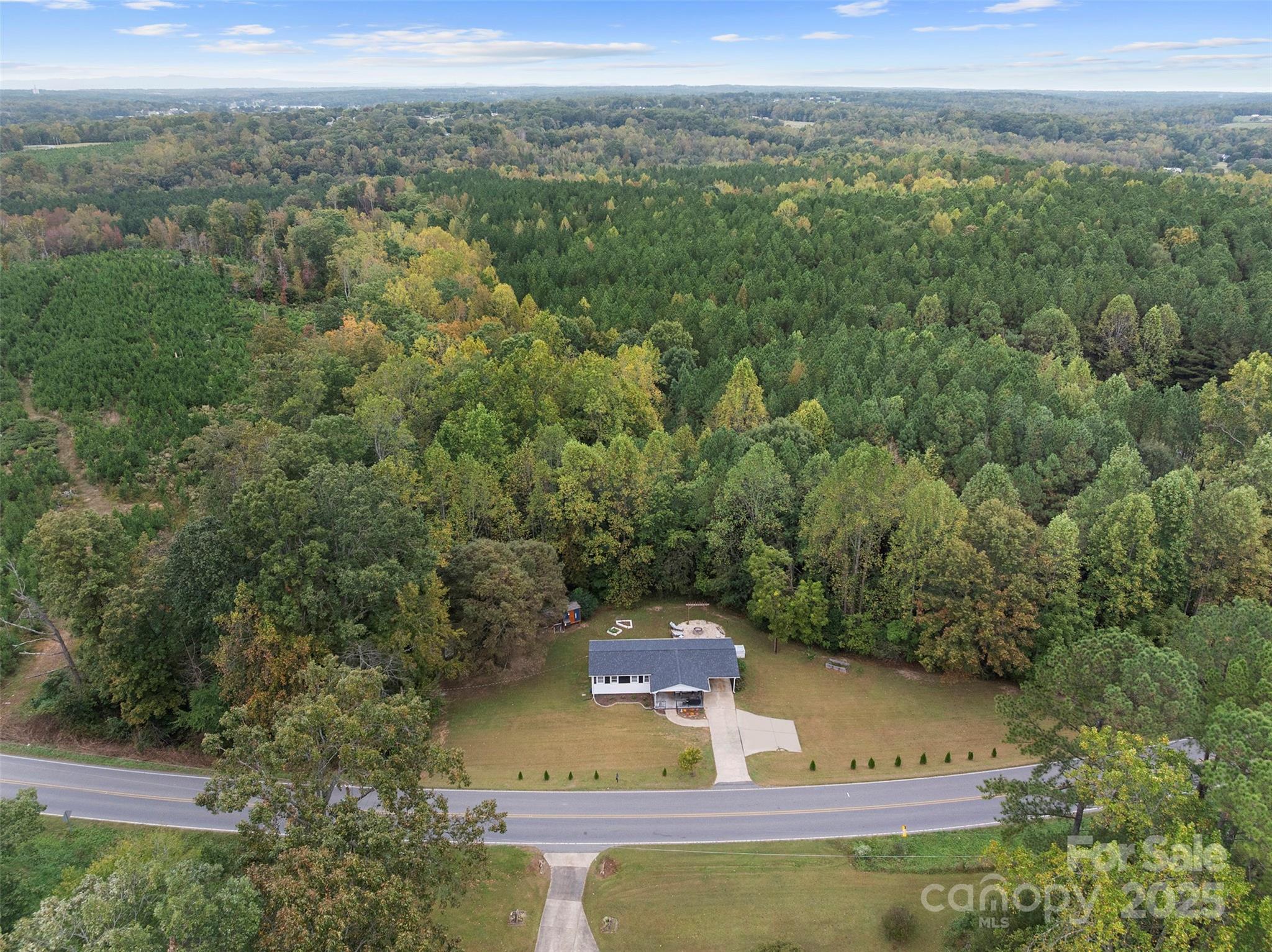 1238 Oak Grove Road Kings Mountain, NC 28086 - Photo 30 of 36 a view of a city with lush green forest