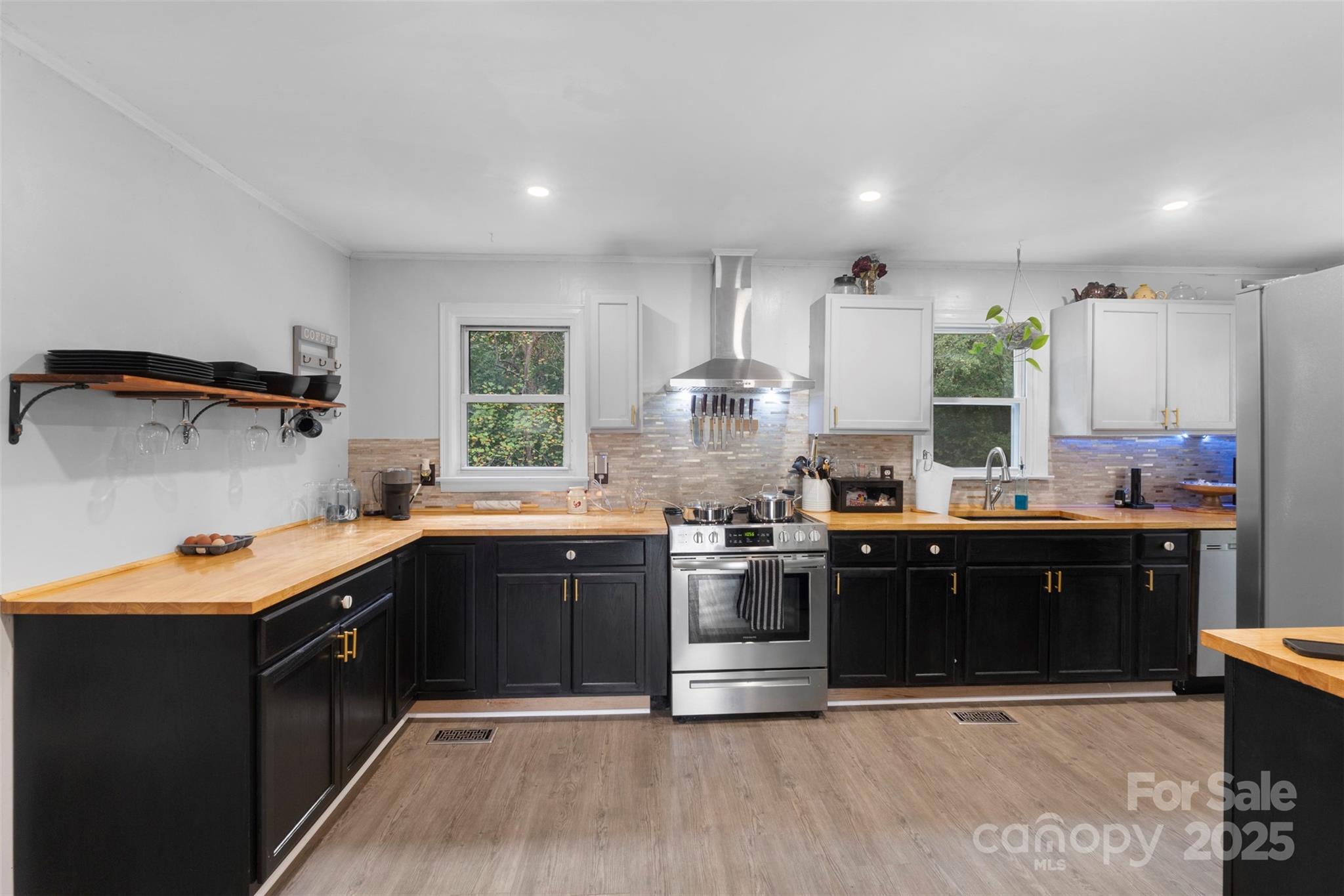 1238 Oak Grove Road Kings Mountain, NC 28086 - Photo 5 of 36 a large kitchen with stainless steel appliances granite countertop a stove a sink dishwasher and a refrigerator