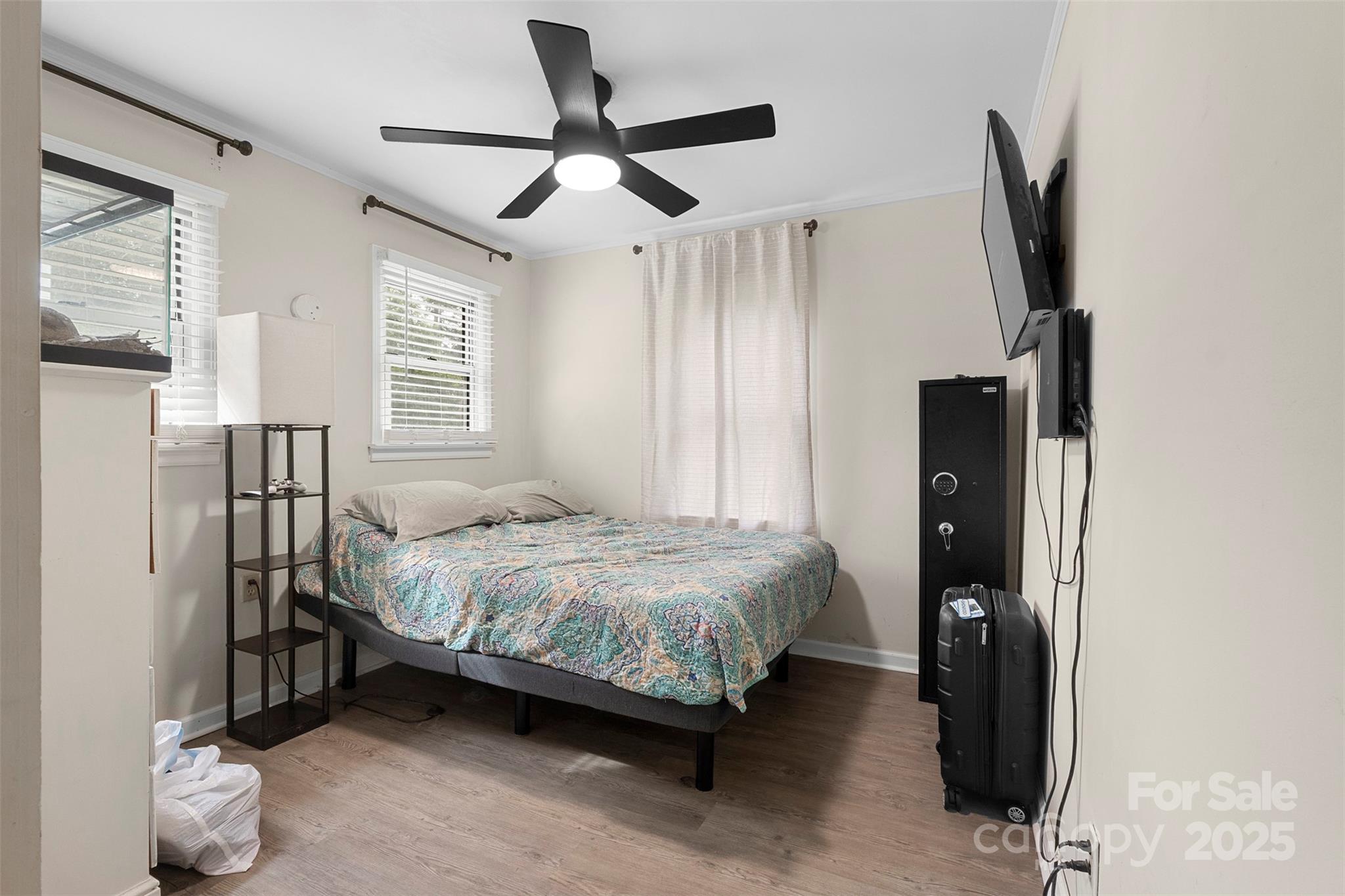 1238 Oak Grove Road Kings Mountain, NC 28086 - Photo 10 of 36 a bedroom with a bed closet and flat tv screen