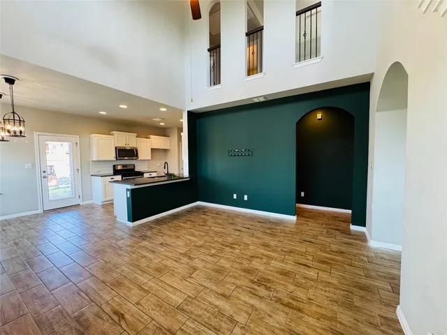 a front view of a house with trees