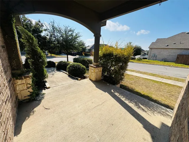a view of a back yard of the house