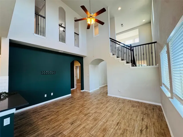 a view of a livingroom with wooden floor