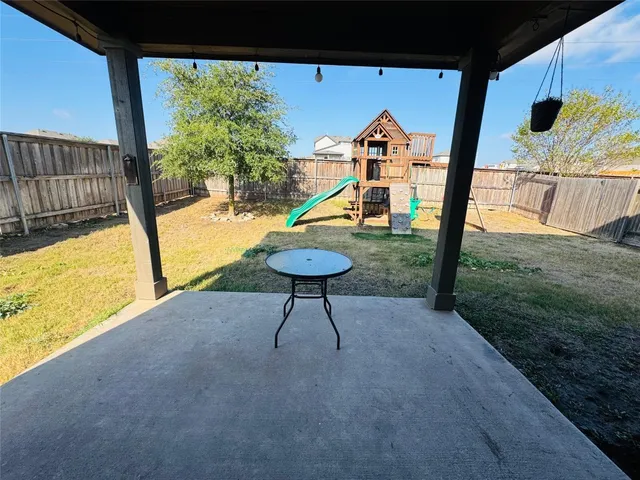 a view of swimming pool from a balcony
