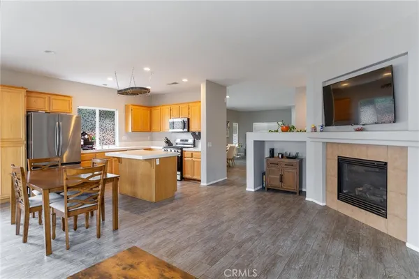 a view of a livingroom with furniture and a fireplace