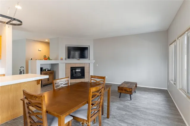 a view of a livingroom with furniture and a fireplace