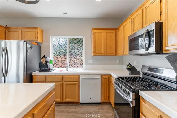 a bedroom with bed and a window