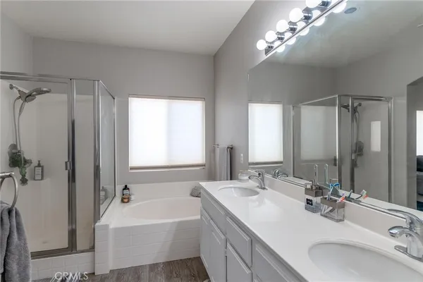 a bedroom with a workspace