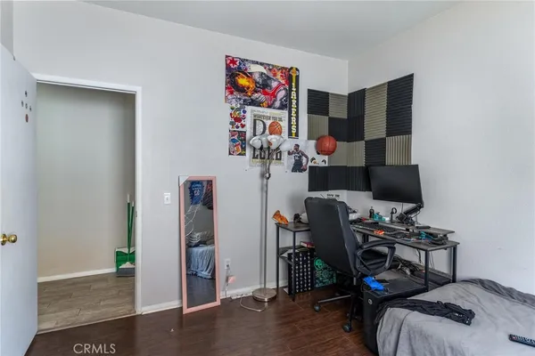 a bathroom with a double vanity sink toilet mirror and shower