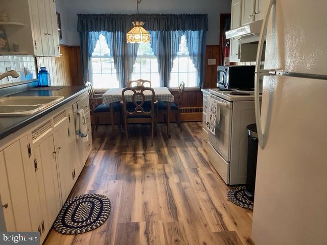 106 Centerton Road Bridgeton, NJ 08302 - Photo 12 of 31 a kitchen with stainless steel appliances a stove and a refrigerator