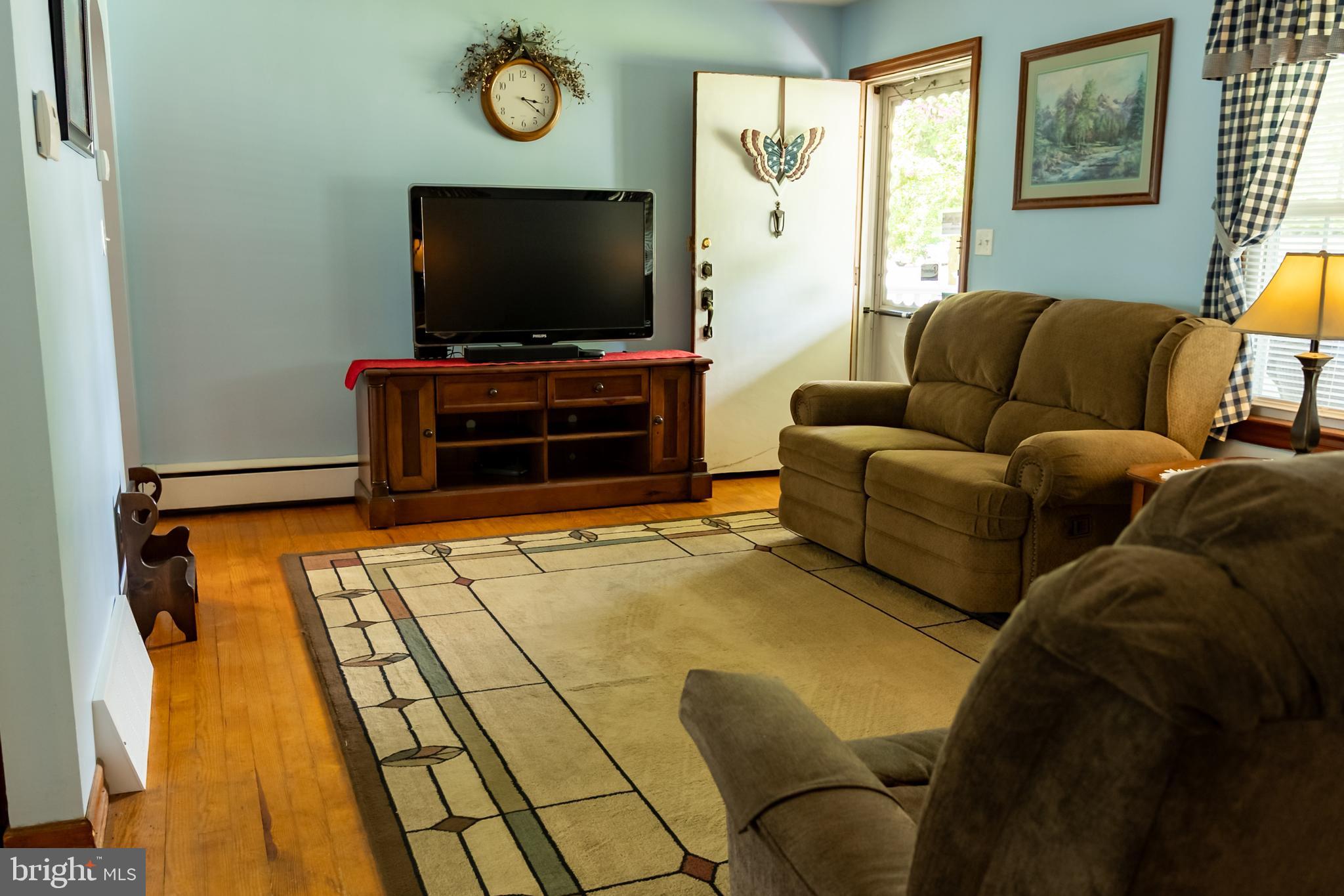 106 Centerton Road Bridgeton, NJ 08302 - Photo 5 of 31 a living room with furniture and a flat screen tv
