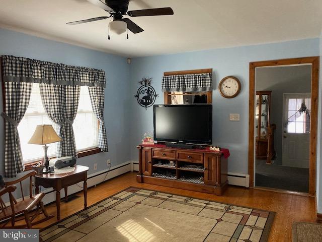 106 Centerton Road Bridgeton, NJ 08302 - Photo 6 of 31 a living room with furniture and a flat screen tv