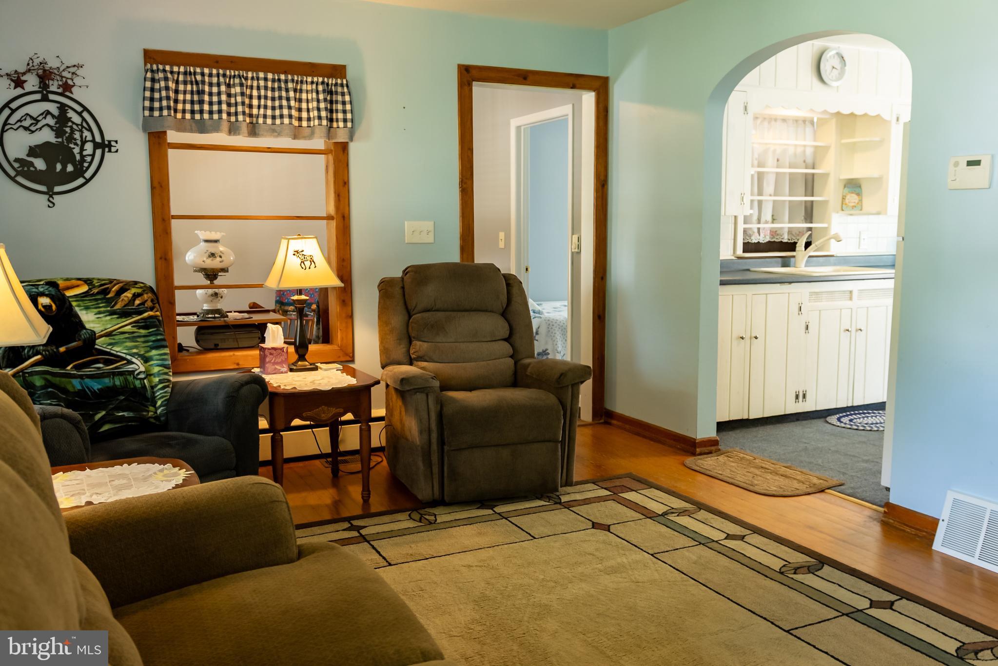 106 Centerton Road Bridgeton, NJ 08302 - Photo 7 of 31 a living room with furniture and a large window