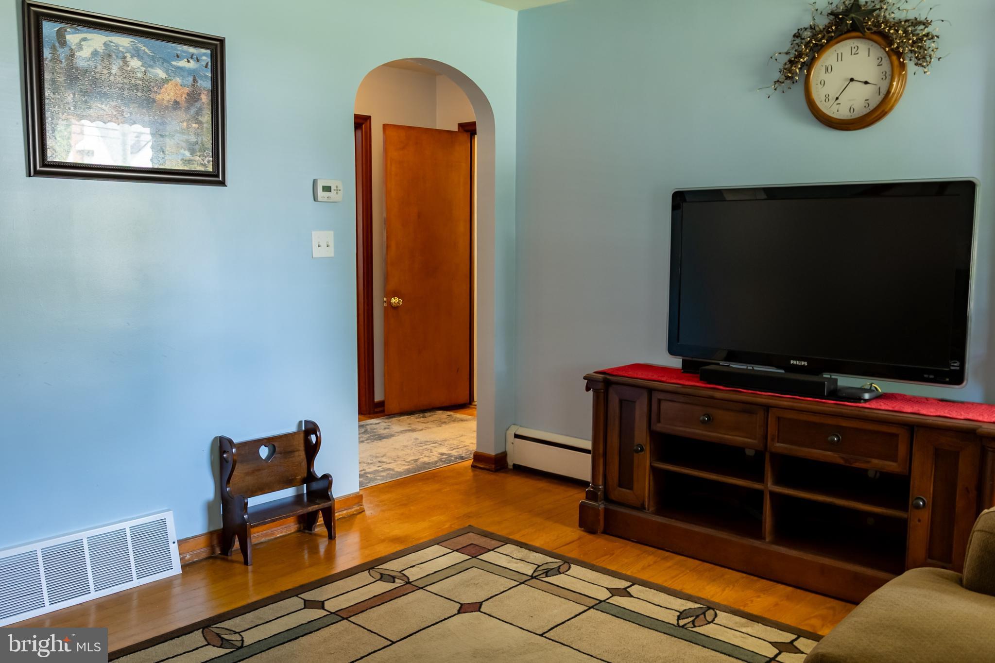 106 Centerton Road Bridgeton, NJ 08302 - Photo 8 of 31 a living room with furniture and a flat screen tv