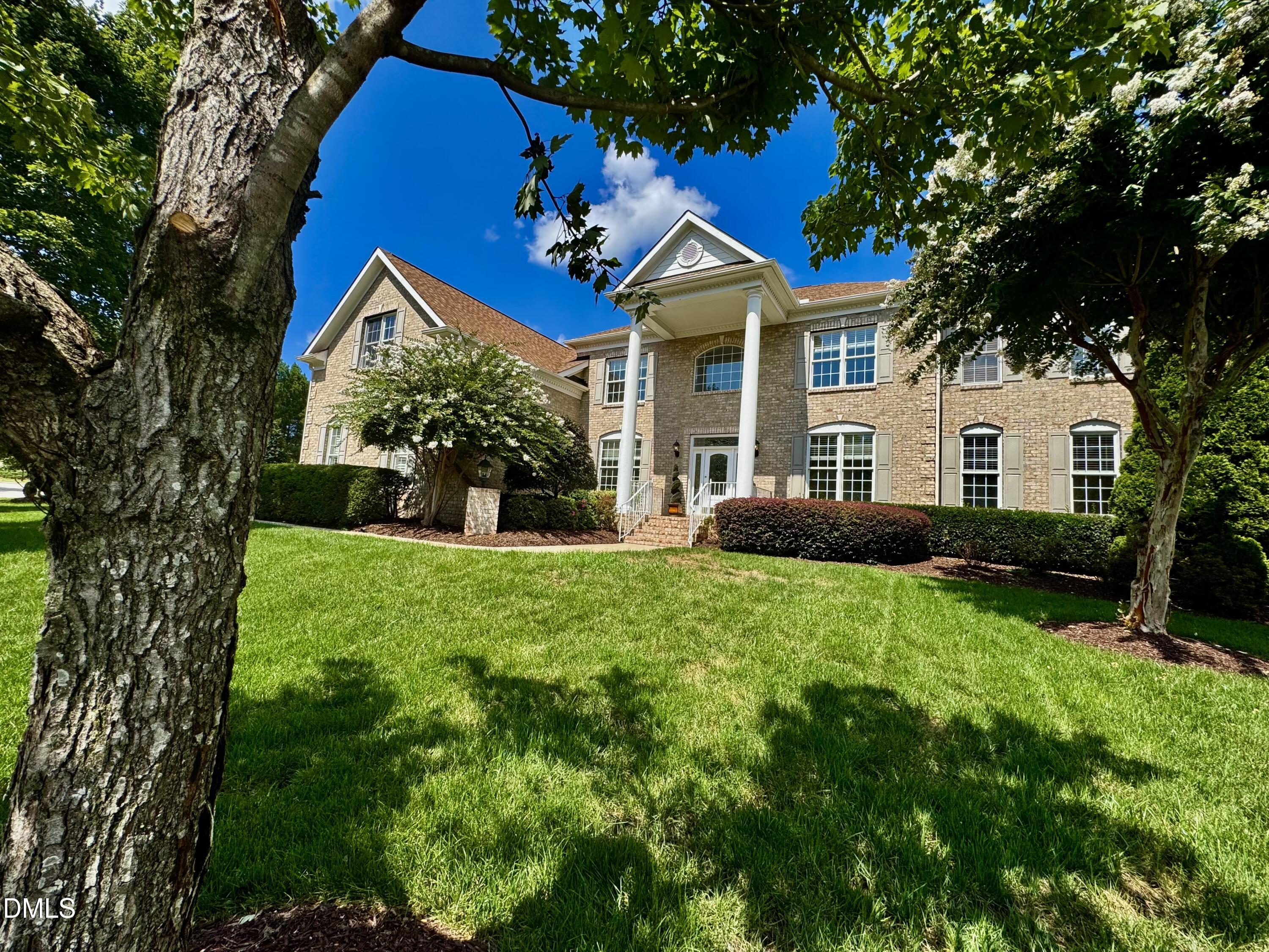 9628 Club Valley Way Raleigh, NC 27617 - Photo 2 of 68 a view of a house with backyard