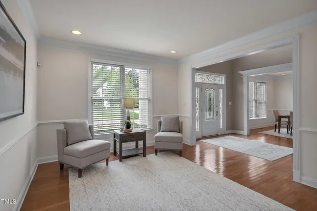a view of a livingroom with furniture and window