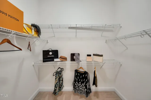 a view of a backyard with large trees