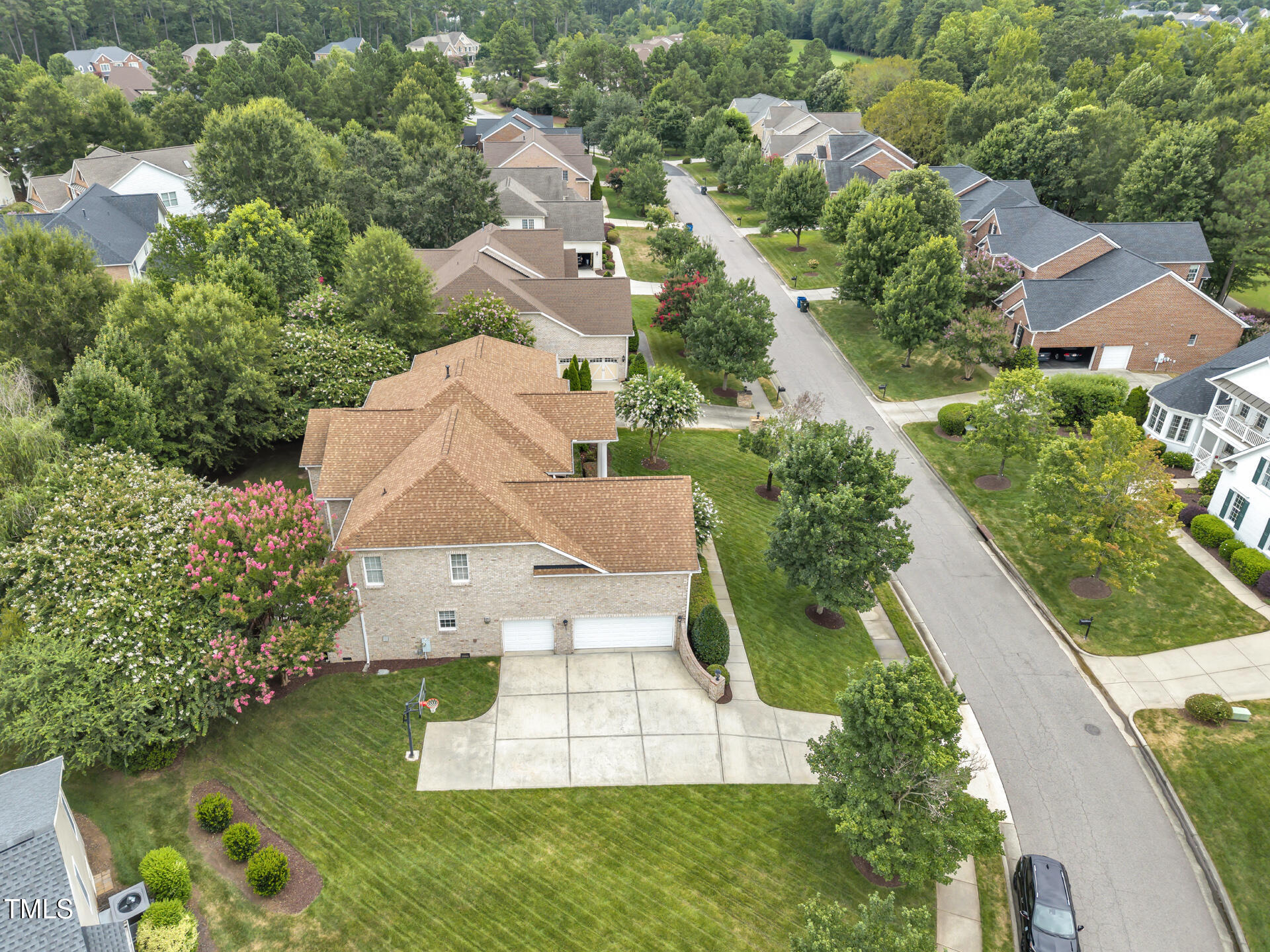 9628 Club Valley Way Raleigh, NC 27617 - Photo 53 of 68 an aerial view of residential houses with outdoor space and street view