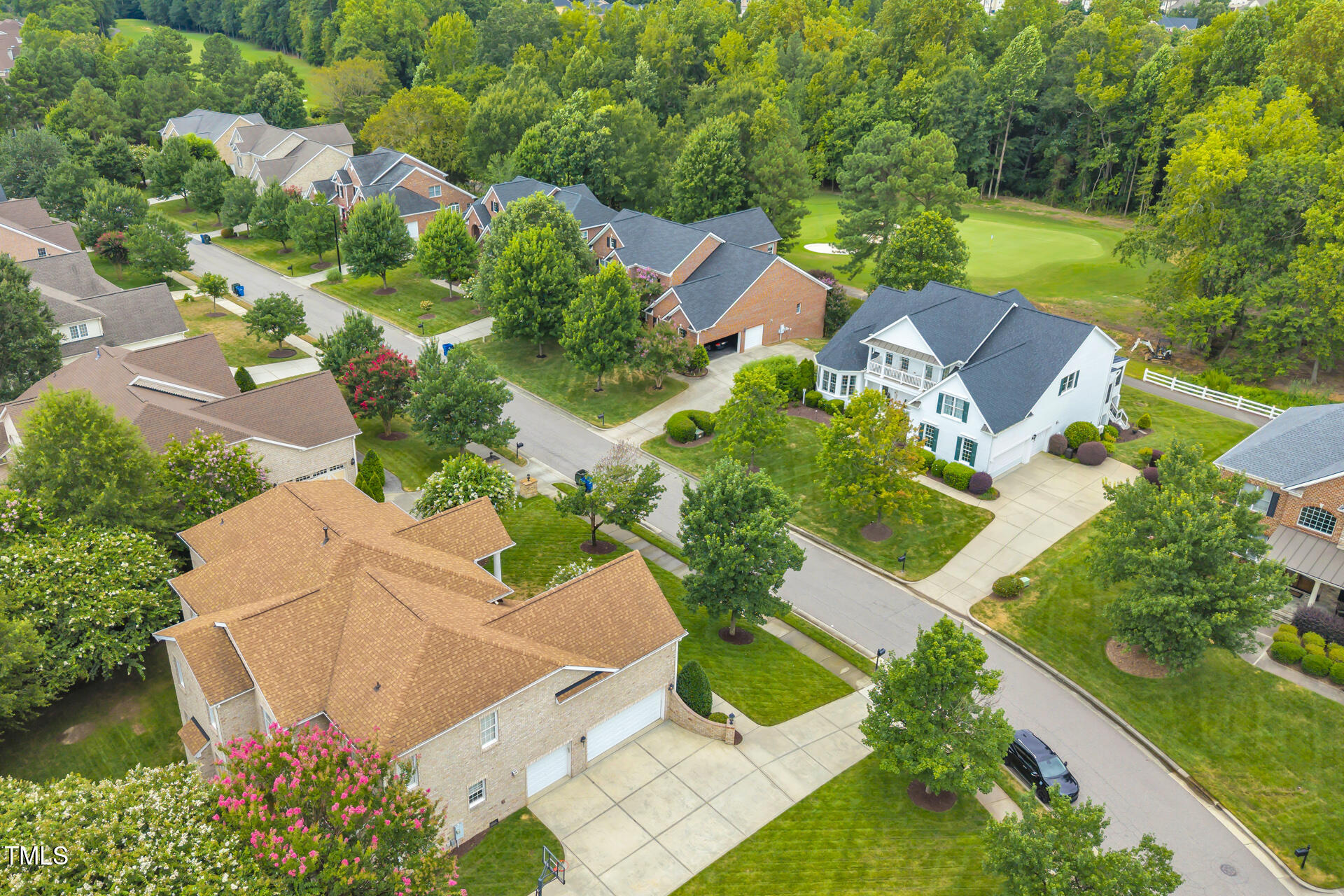 9628 Club Valley Way Raleigh, NC 27617 - Photo 62 of 68 an aerial view of residential houses with outdoor space and street view