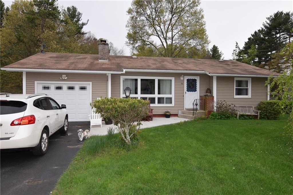 29 Jolley Road Plainfield, CT 06239 - Photo 1 of 1 a house view with a sitting space fire pit and couches chairs