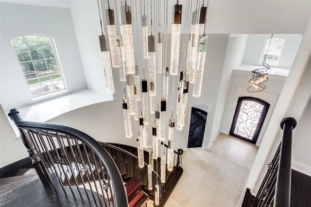 a view of an entryway with furniture and wooden floor