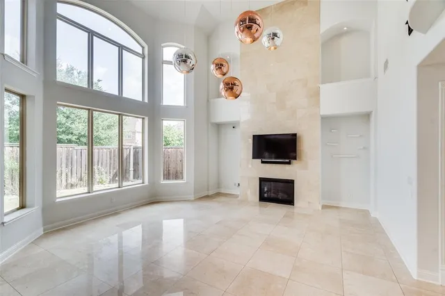 a view of livingroom with furniture flat screen tv and window