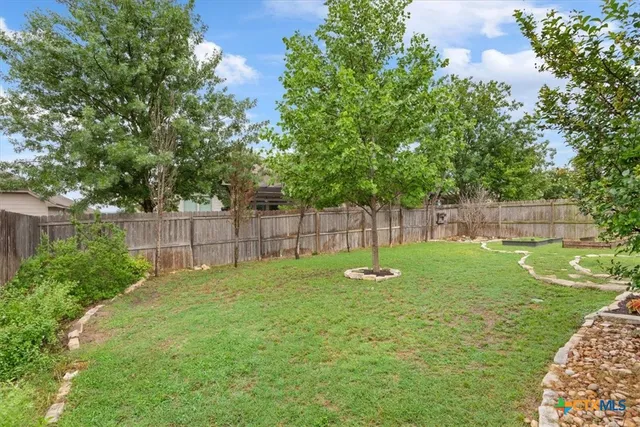 a view of a garden with a slide