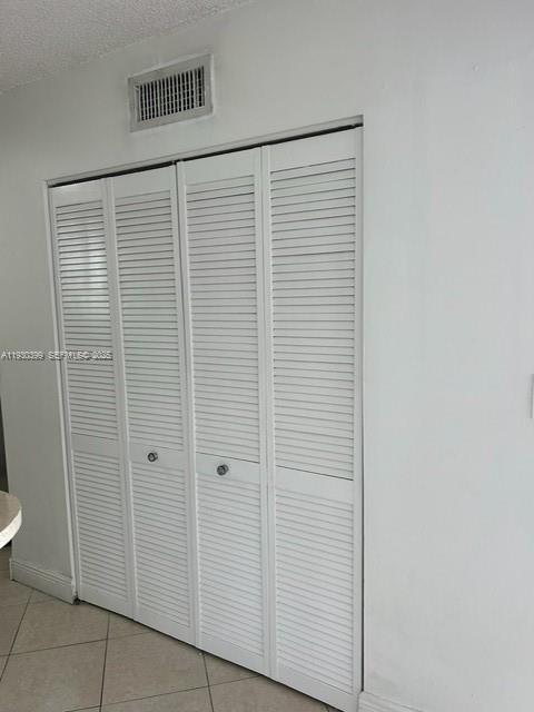 6292 Northwest 186th Street, Unit 214 Hialeah, FL 33015 - Photo 12 of 13 a view of a room with an empty space