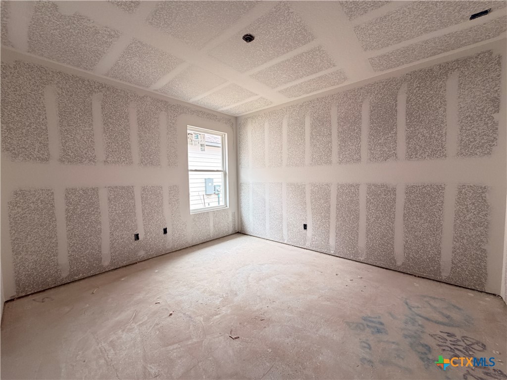 306 University Avenue Troy, TX 76579 - Photo 11 of 16 a view of an empty room with a window