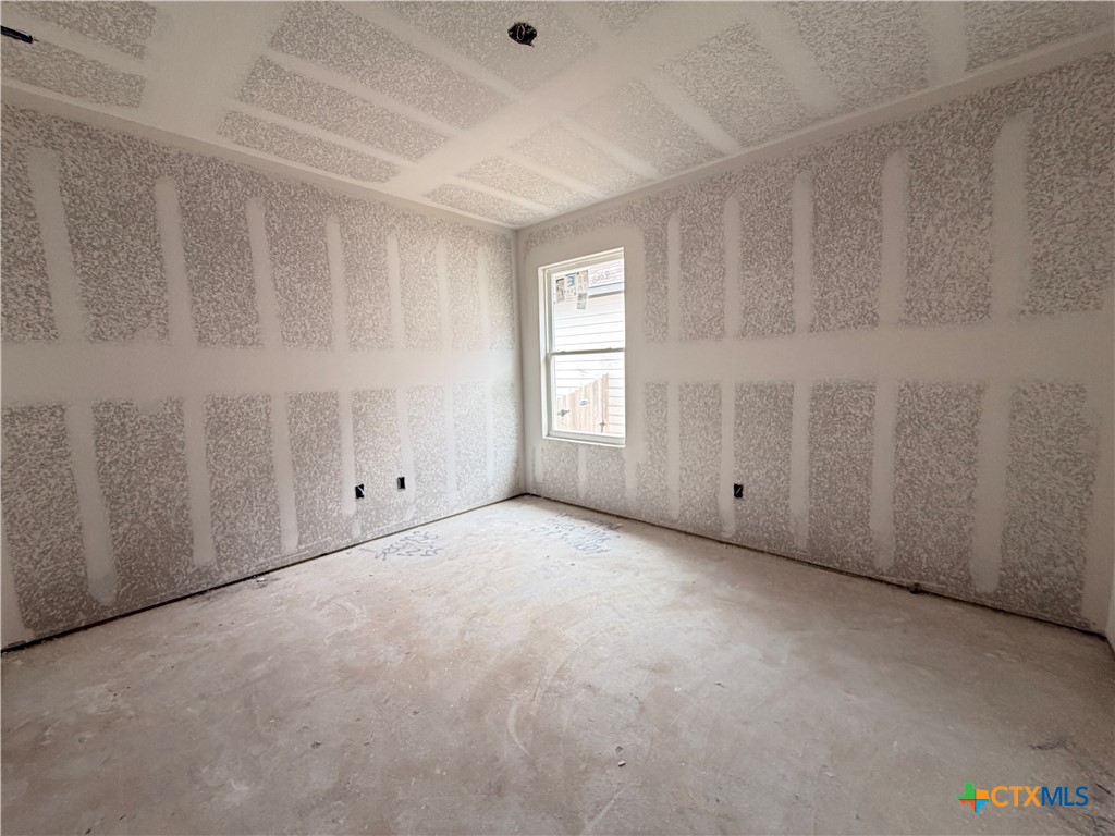 306 University Avenue Troy, TX 76579 - Photo 12 of 16 a view of an empty room with a window