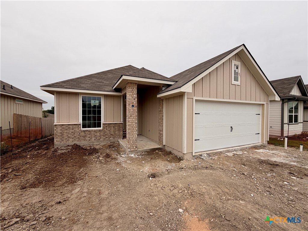 306 University Avenue Troy, TX 76579 - Photo 2 of 16 a view of a house with a yard