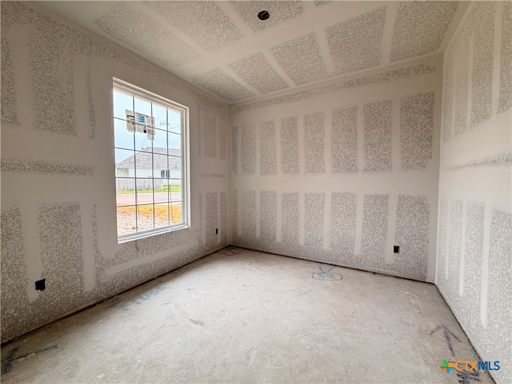 306 University Avenue Troy, TX 76579 - Photo 3 of 16 a view of an empty room with a window