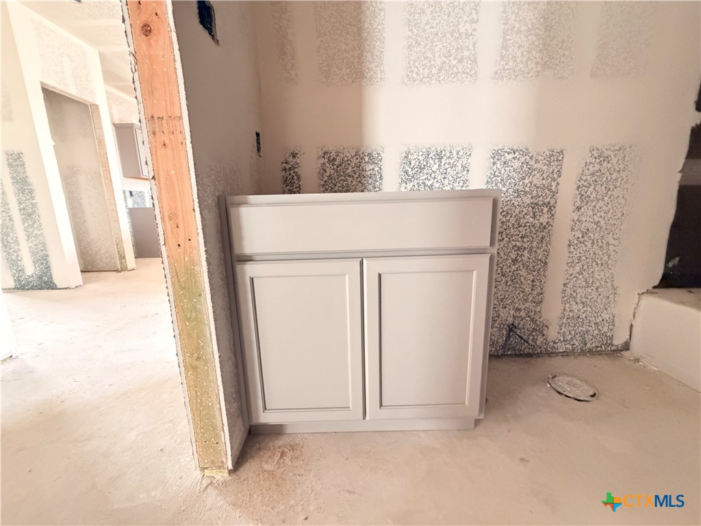 306 University Avenue Troy, TX 76579 - Photo 8 of 16 a view of a bathroom with a sink a toilet and a shower