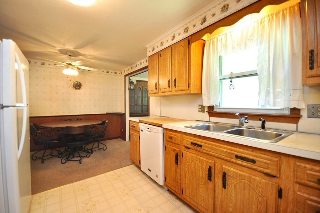 252 Sunrise Terrace Springfield, MA 01119 - Photo 13 of 41 a kitchen with a sink and a window