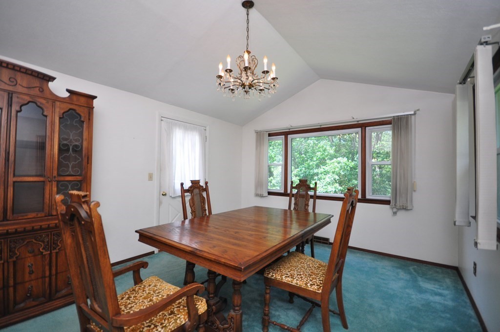 252 Sunrise Terrace Springfield, MA 01119 - Photo 15 of 41 a view of a dining room with furniture window and outside view