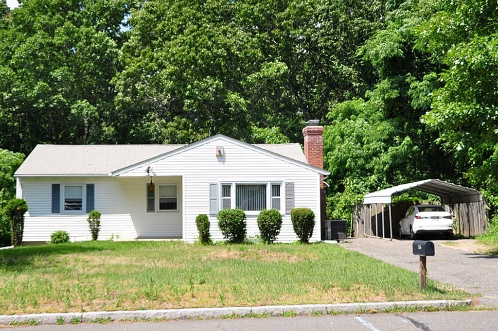 252 Sunrise Terrace Springfield, MA 01119 - Photo 2 of 41 a front view of a house with a yard
