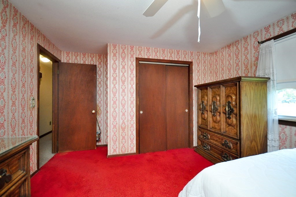 252 Sunrise Terrace Springfield, MA 01119 - Photo 23 of 41 a bedroom with a large bed and a closet