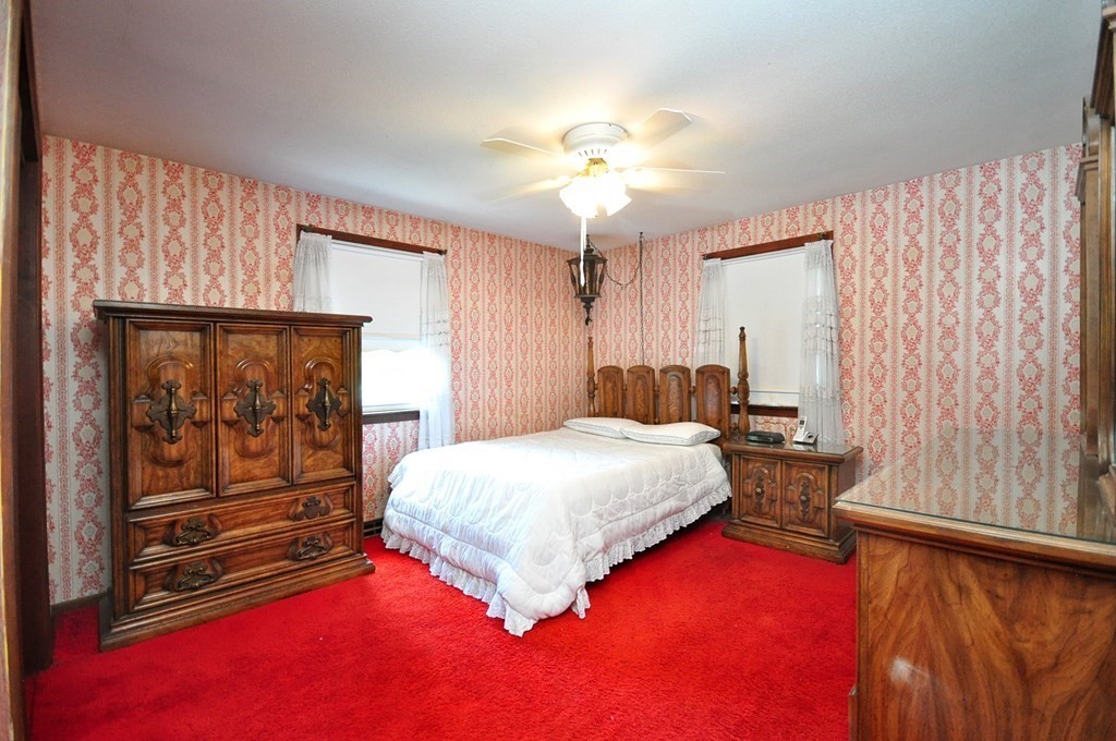 252 Sunrise Terrace Springfield, MA 01119 - Photo 25 of 41 a spacious bedroom with a bed and a window