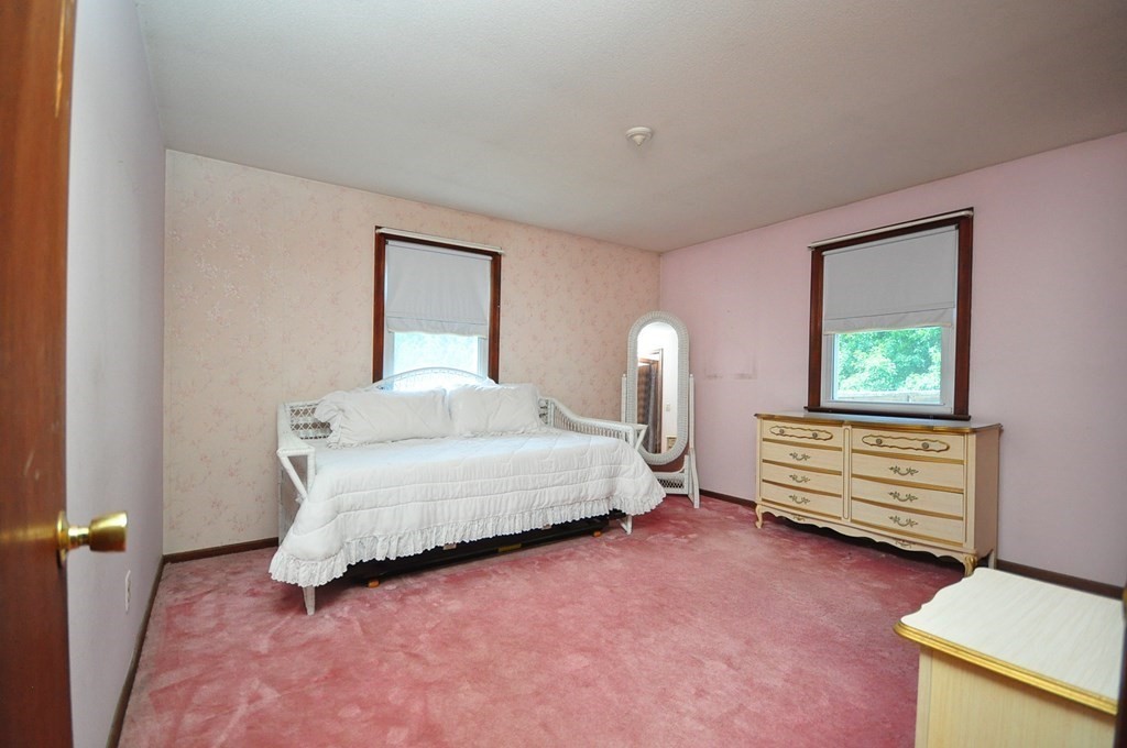 252 Sunrise Terrace Springfield, MA 01119 - Photo 28 of 41 a bedroom with a bed and a dresser