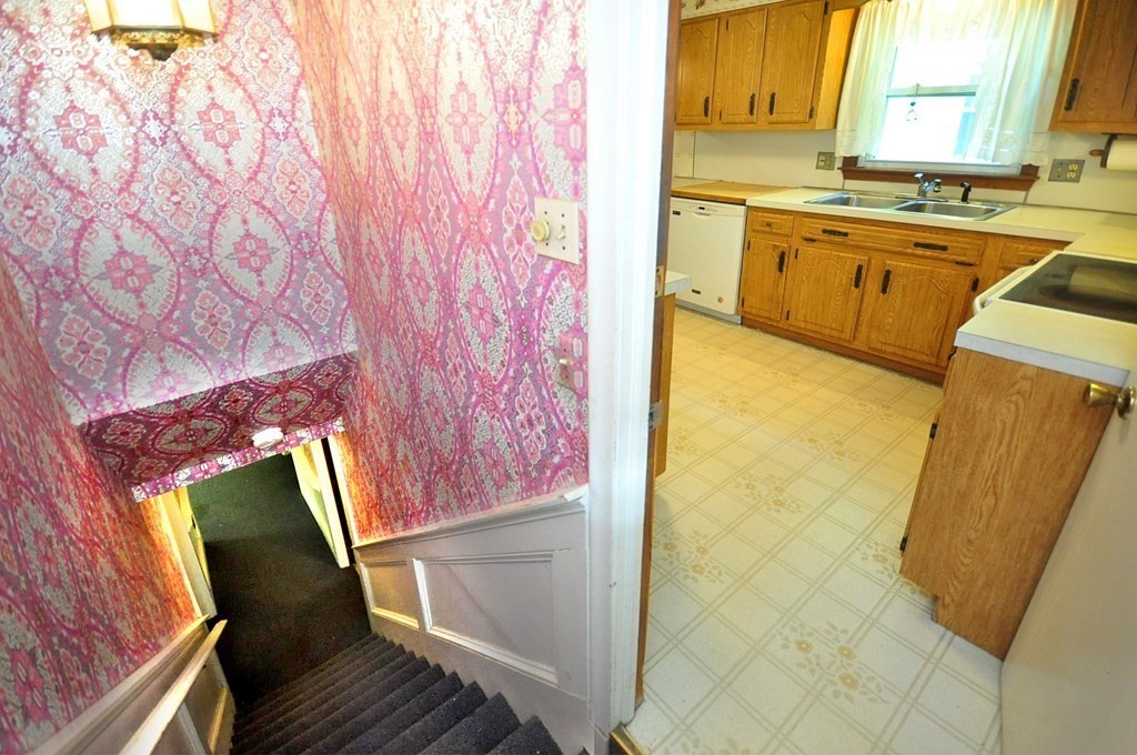 252 Sunrise Terrace Springfield, MA 01119 - Photo 30 of 41 a view of a kitchen with wooden floor and furniture