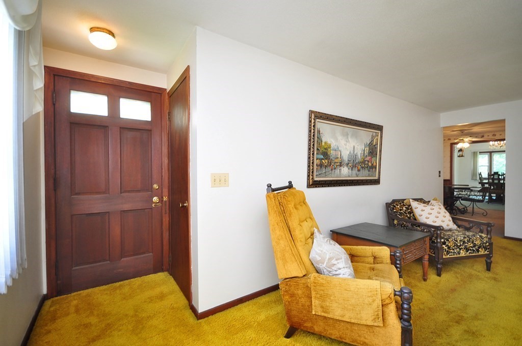252 Sunrise Terrace Springfield, MA 01119 - Photo 7 of 41 a living room with furniture and a table