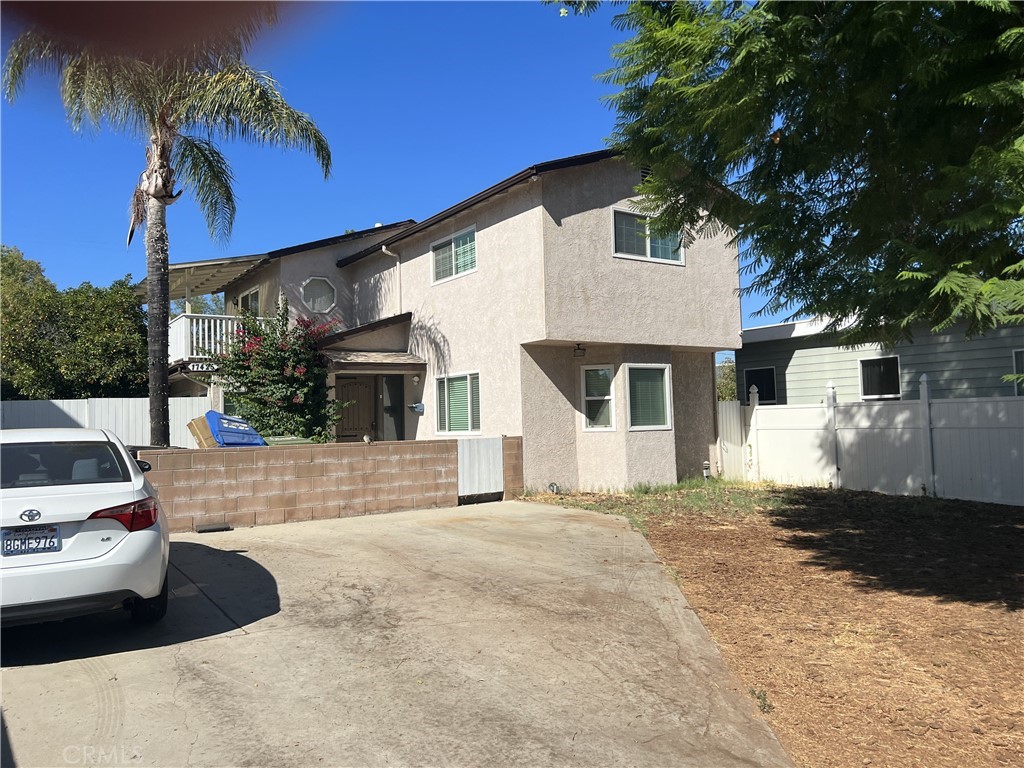 17425 Los Alimos Street Granada Hills, CA 91344 - Photo 1 of 25 a view of a house with a patio