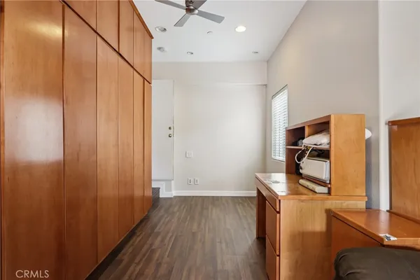 a view of a storage & utility room with wooden floor