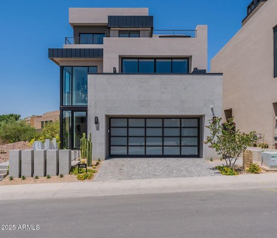 front view of a house with a street