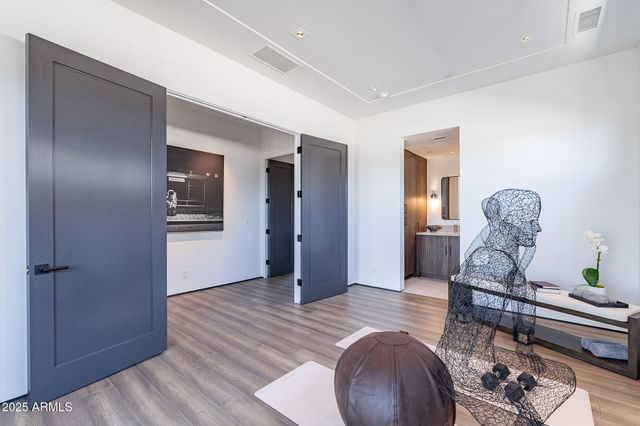 a room with furniture and wooden floor