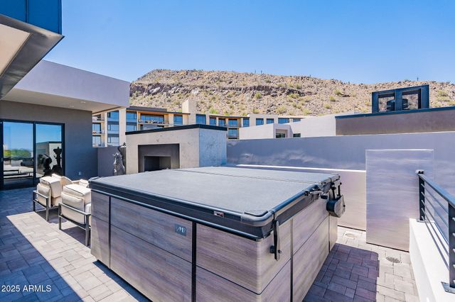a spacious bathroom with a sink and a mirror