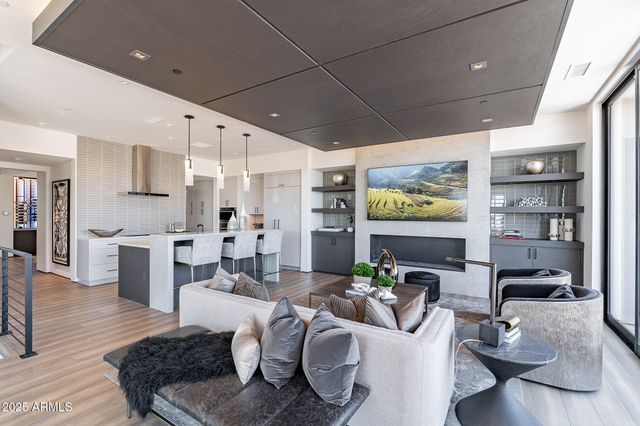 a living room with furniture and a table